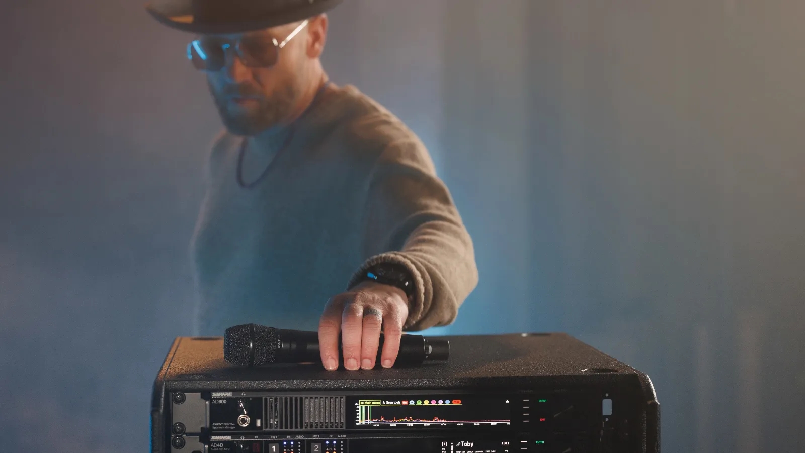 TobyMac picking up KSM11 off of rack with AD600 and Axient Digital