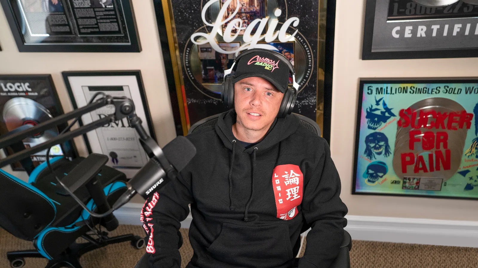 Logic Chills Out in His Streaming Studio with the Shure AONIC 50 Wireless Headphones and MV7 Podcast Mic