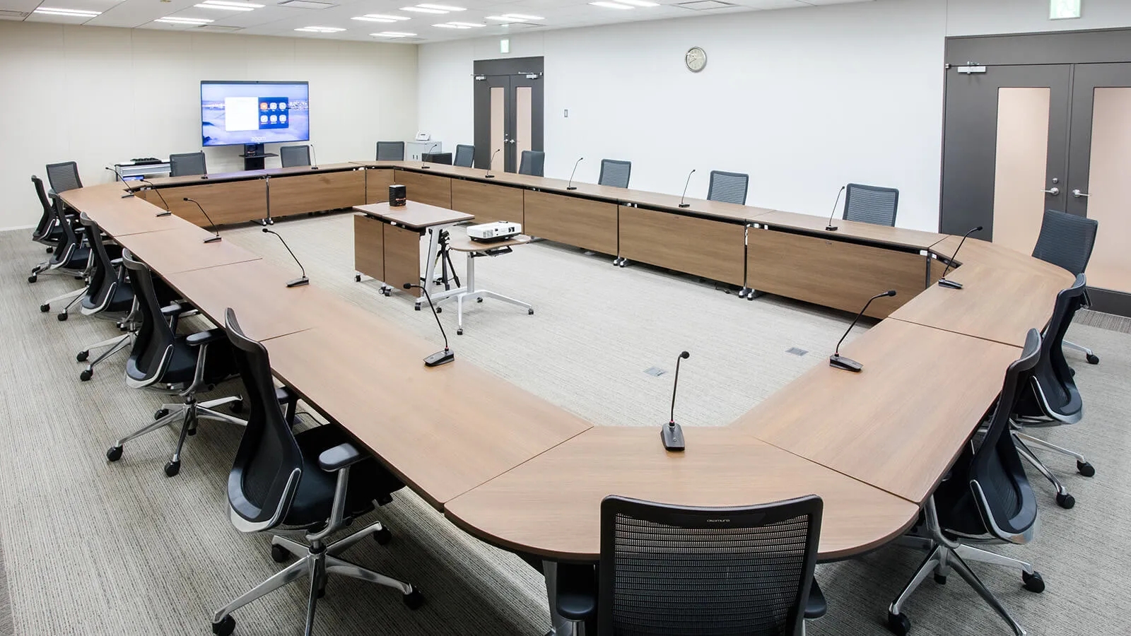 Boardroom with Wireless Gooseneck Microphones and Zoom Web Conferencing
