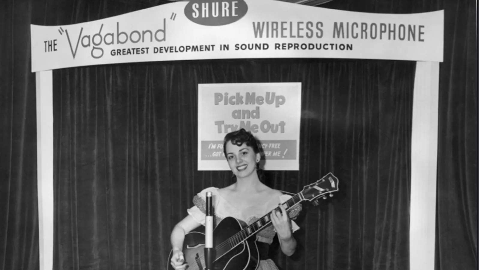 An archive image of a woman using a Vagabond wireless mic